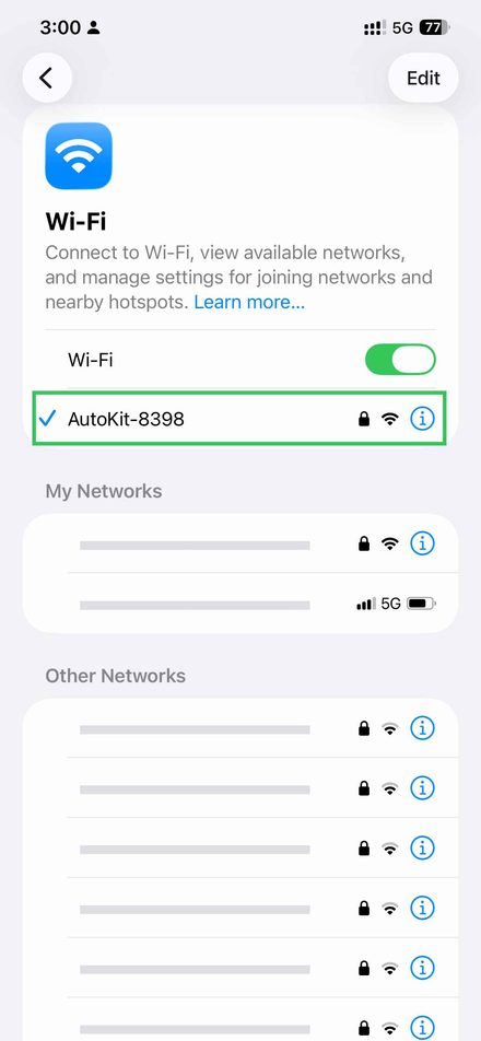 iPhone Wi-Fi screen showing blue checkmark next to AutoKit-8398, confirming connection